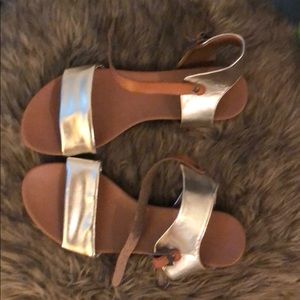 Sandals with an ankle strap